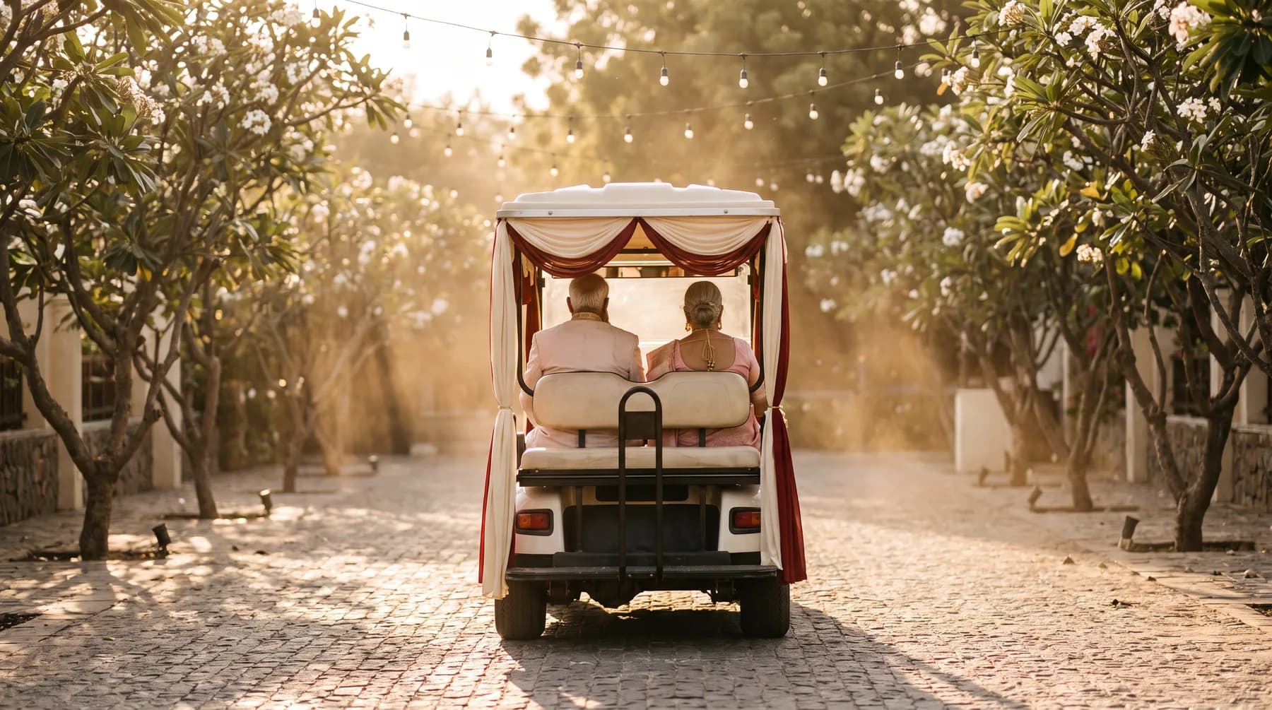 Elders being driven to a wedding function in a buggy
